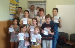 Десять паспортів за раз: багатодітна родина успішно оформила  документи для подорожей